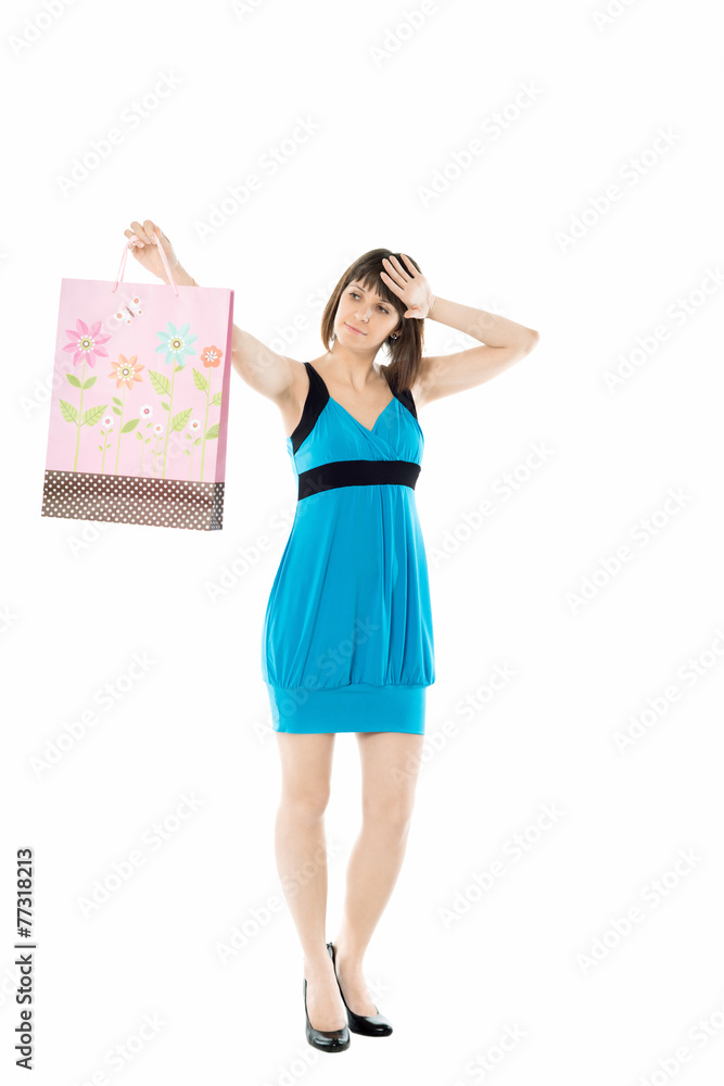 Naklejka premium Shopping. Girl with shopping bag isolated on white background