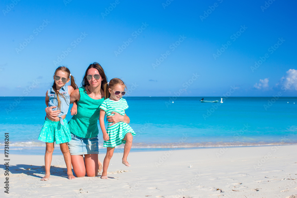 Happy family having fun during beach vacation Happy family having fun during beach vacation