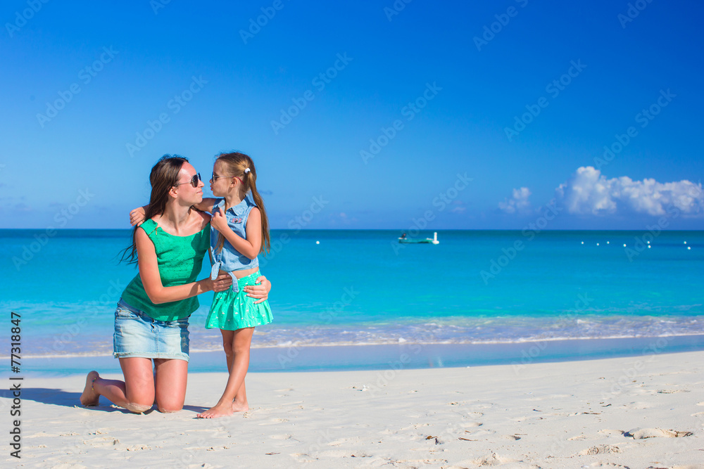 Young mom and little girl during summer vacation Young mom and little girl during summer vacation