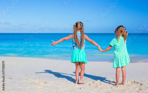 Little adorable girls during tropical summer vacation