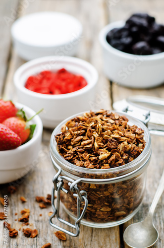granola with yogurt, nuts, goji berries and strawberries