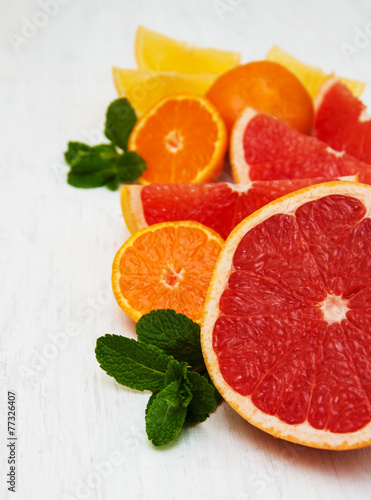 Fresh citrus fruits with green mint