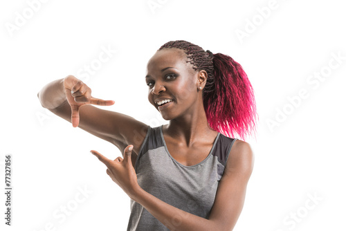 Girl wearing sport clothes gesturing frame