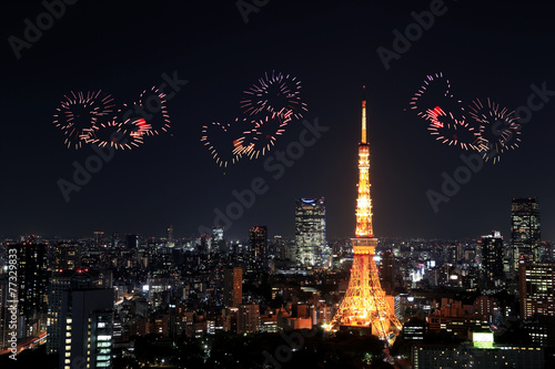 heart sparkle Fireworks celebrating over Tokyo cityscape at nigh