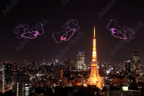 heart sparkle Fireworks celebrating over Tokyo cityscape at nigh © geargodz