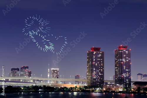heart sparkle Fireworks celebrating over Odaiba, Tokyo cityscape