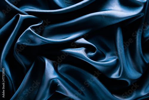 Abstract wave textile texture or background in blue color