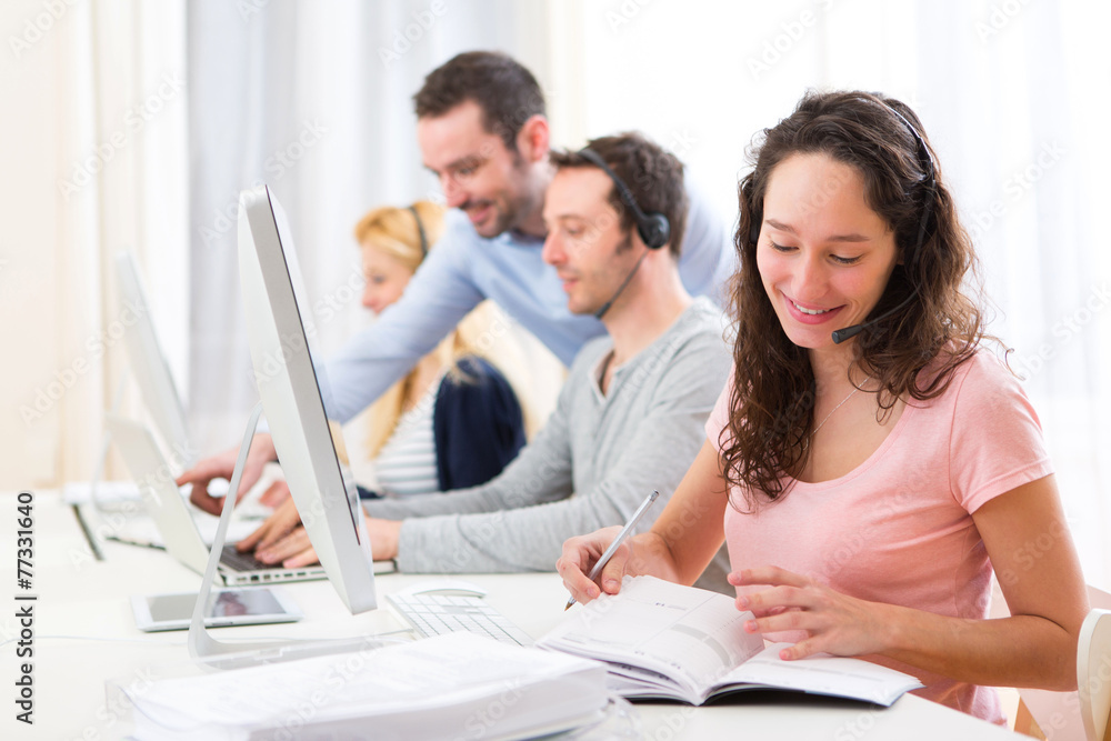 Young attractive woman working in a call center Young attractive woman working in a call center