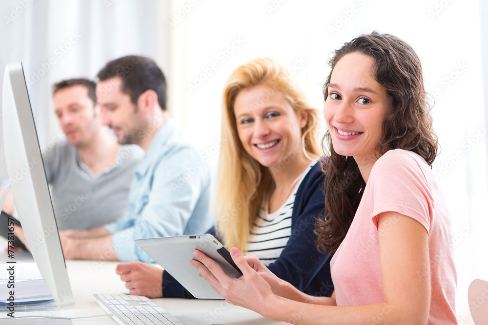 Young attractive people working together at the office Young attractive people working together at the office