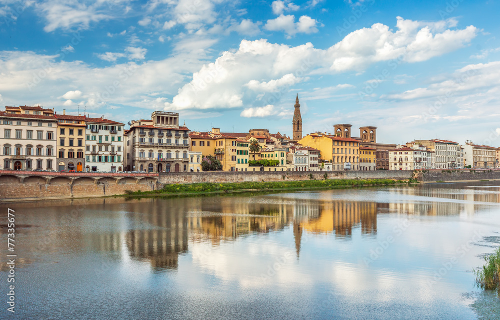 View of Ponte Vecchio with reflections in Arno River, Florence,