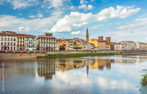 View of Ponte Vecchio with reflections in Arno River, Florence,