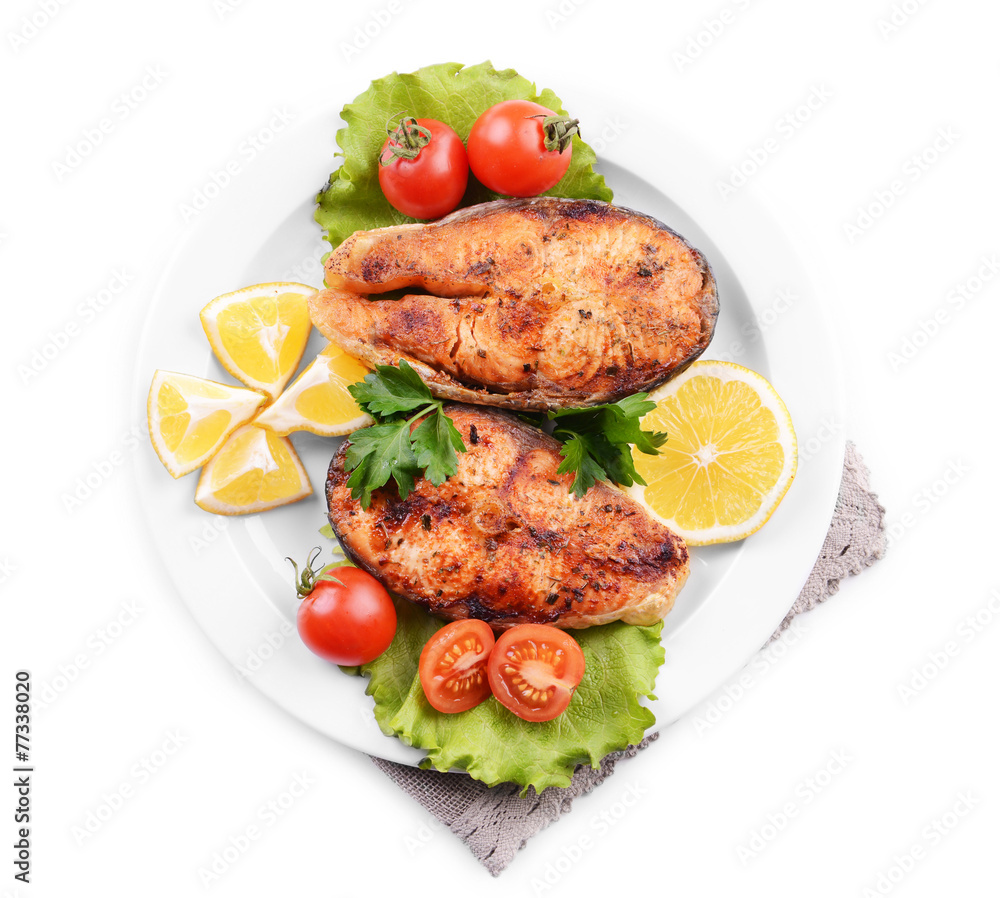 Tasty baked fish on plate isolated on white Tasty baked fish on plate isolated on white
