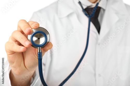 Male doctor working with stethoscope