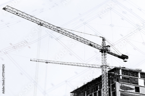 Obraz na płótnie Construction site with cranes on silhouette background w salonie