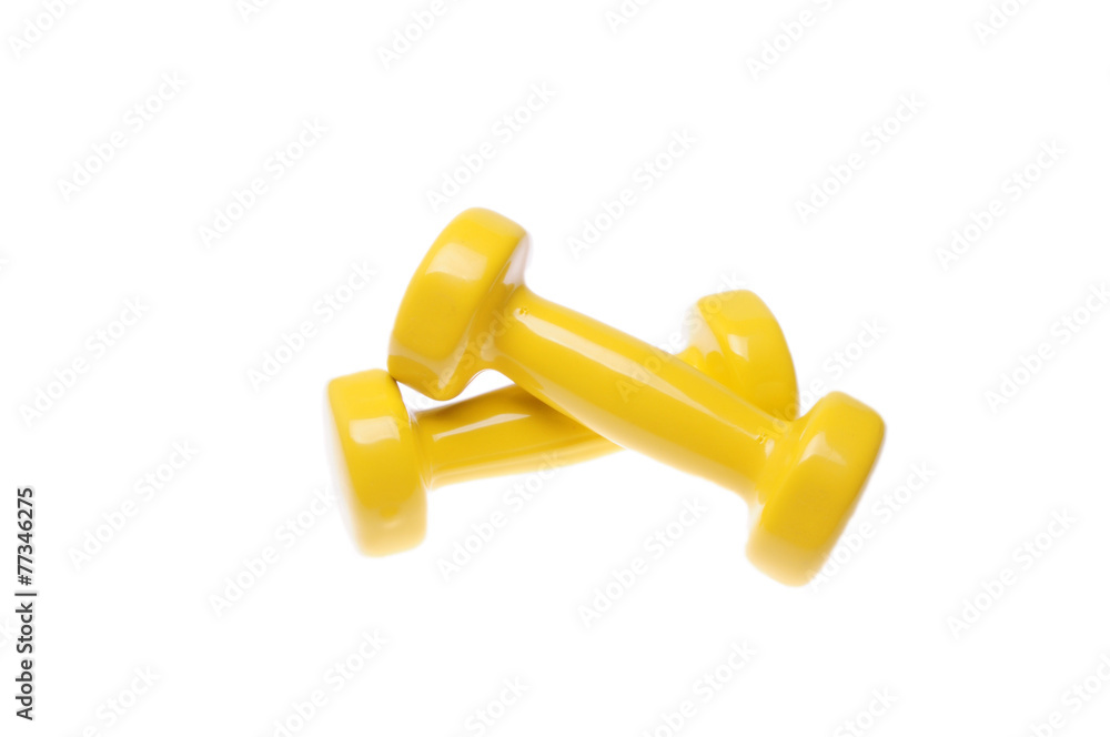 Pair of yellow dumbbells Isolated on white background Pair of yellow dumbbells Isolated on white background