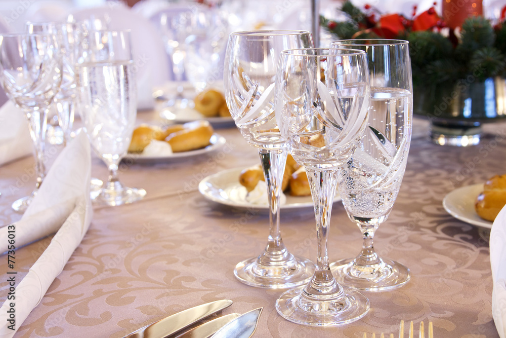 Luxury banquet table setting with crystal glasses. Luxury banquet table setting with crystal glasses.