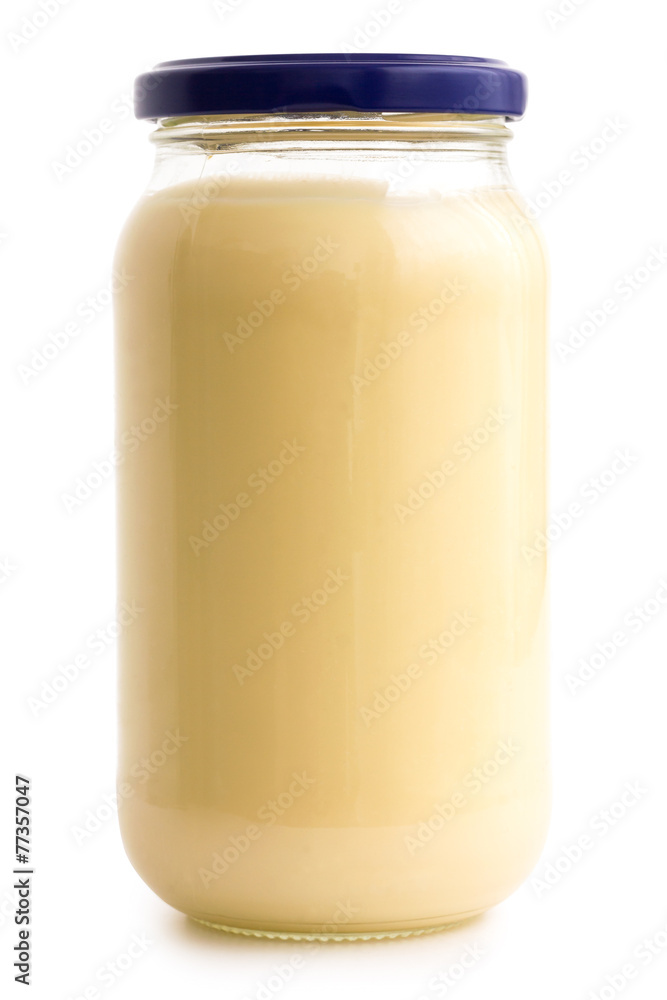Glass mayonnaise jar with blue lid on white. Glass mayonnaise jar with blue lid on white.
