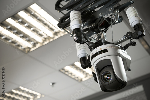 Camcorder recorder with lamps in a television studio