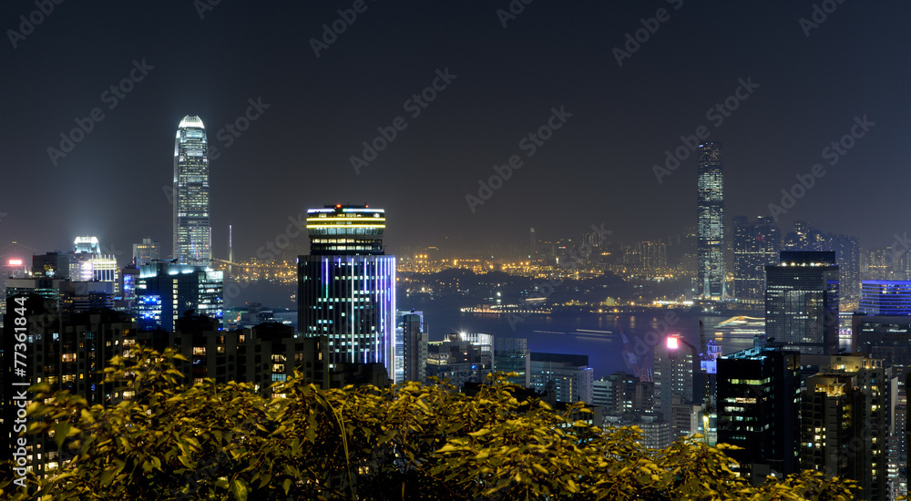 Obraz premium City night scene with business office skyscrapers in Hong Kong,