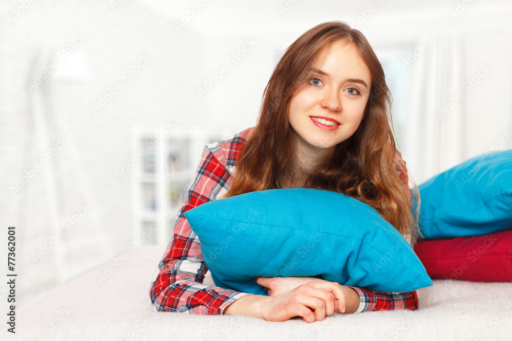 Teenage girl in her room
