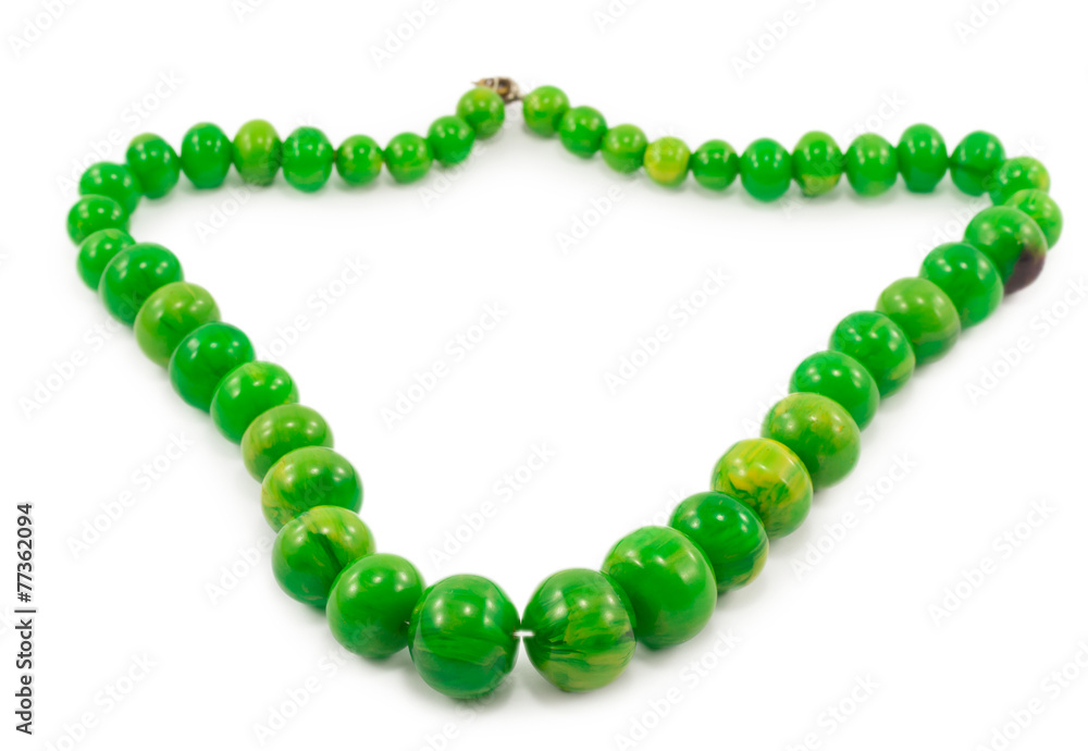 Obraz premium green beads isolated on white background