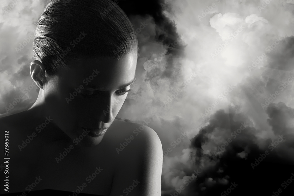 Moody atmospheric portrait of a young woman. Mistery Woman