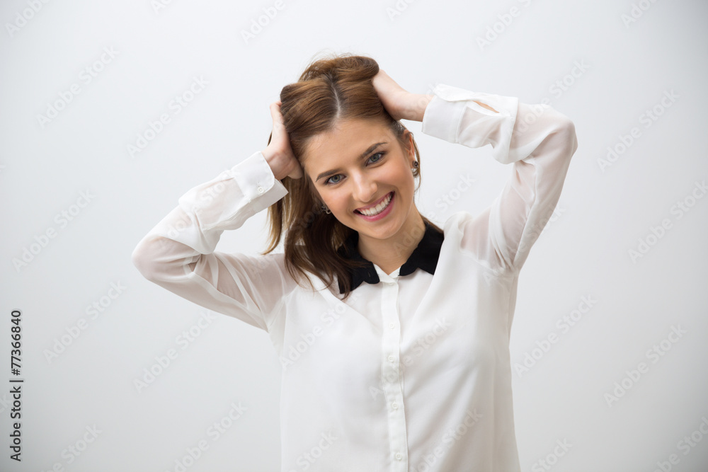 Portrait of attractive woman over gray background Portrait of attractive woman over gray background