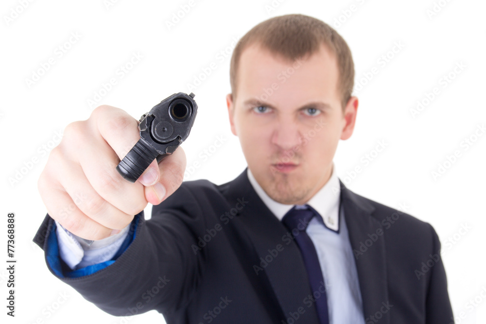 angry man in business suit shooting with gun isolated on white angry man in business suit shooting with gun isolated on white