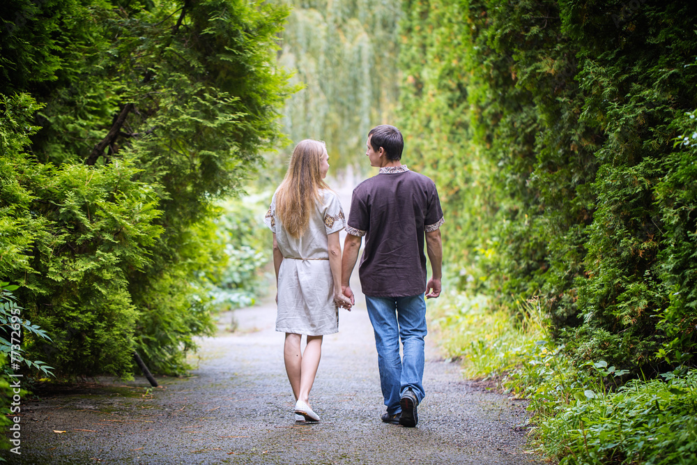 couple walk hand park couple walk hand park