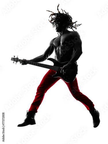 Photos african man guitarist bassist  player playing silhouette