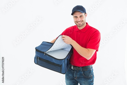 Pizza delivery man opening bag