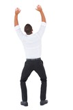 Businessman cheering with arms up