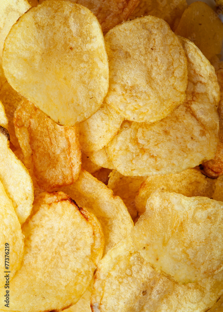 Potato chips background close-up