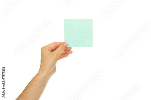 Woman hand holds virtual card or smart phone on white background