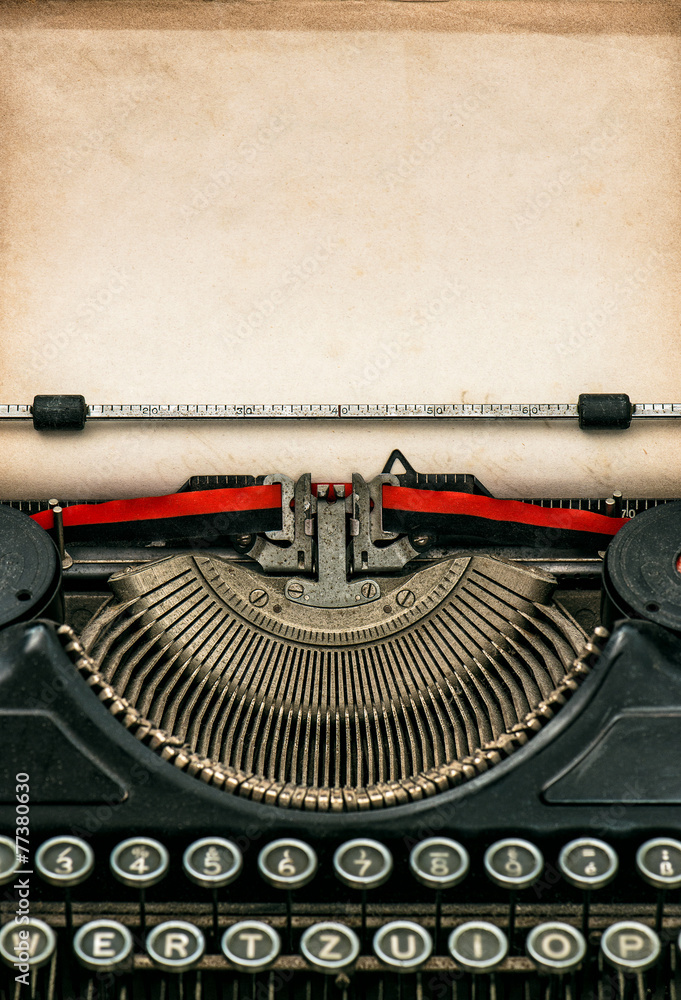 Antique Typewriter With Aged Textured Paper Sheet Stock Photo