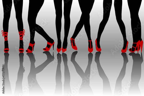 Female legs silhouettes with red shoes