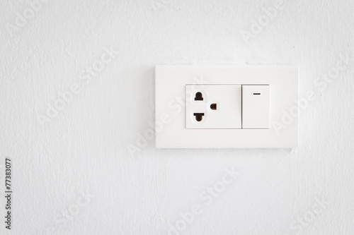 Electrical switch and plug on wall