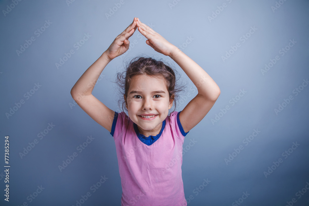 baby girl of European appearance 6 years hands above his head on baby girl of European appearance 6 years hands above his head on