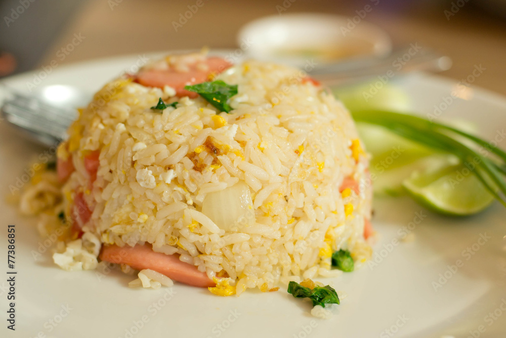 Fried rice on a plate placed on the table