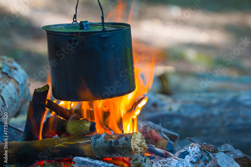 tuoristic cauldron on a fire photo