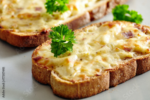 Oven baked toast with cheese and ham