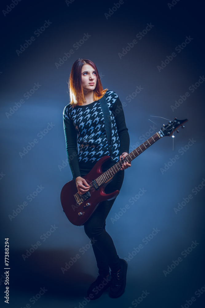 brown hair girl of European appearance twenty years playing guit brown hair girl of European appearance twenty years playing guit