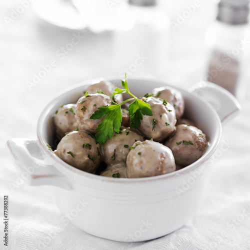 swedish meatballs in stoneware dish photo