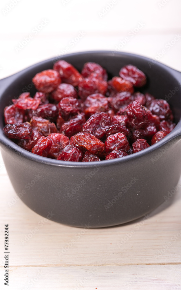 dried cranberries in a bowl ,fruit full of vitamin c. dried cranberries in a bowl ,fruit full of vitamin c.