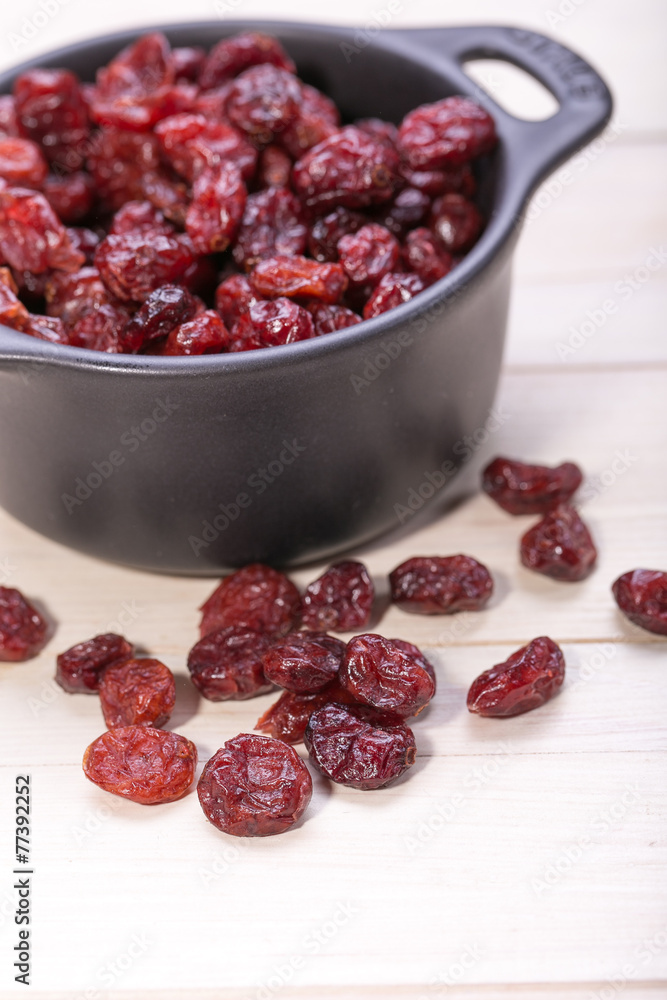 dried cranberries in a bowl ,fruit full of vitamin c. dried cranberries in a bowl ,fruit full of vitamin c.
