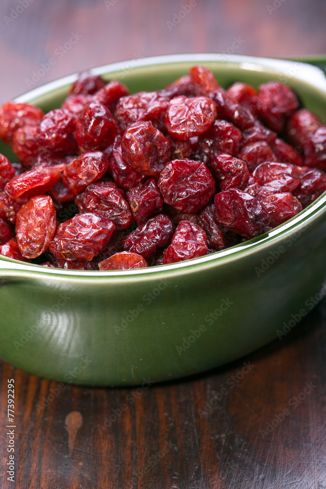 dried cranberries in a bowl ,fruit full of vitamin c. dried cranberries in a bowl ,fruit full of vitamin c.