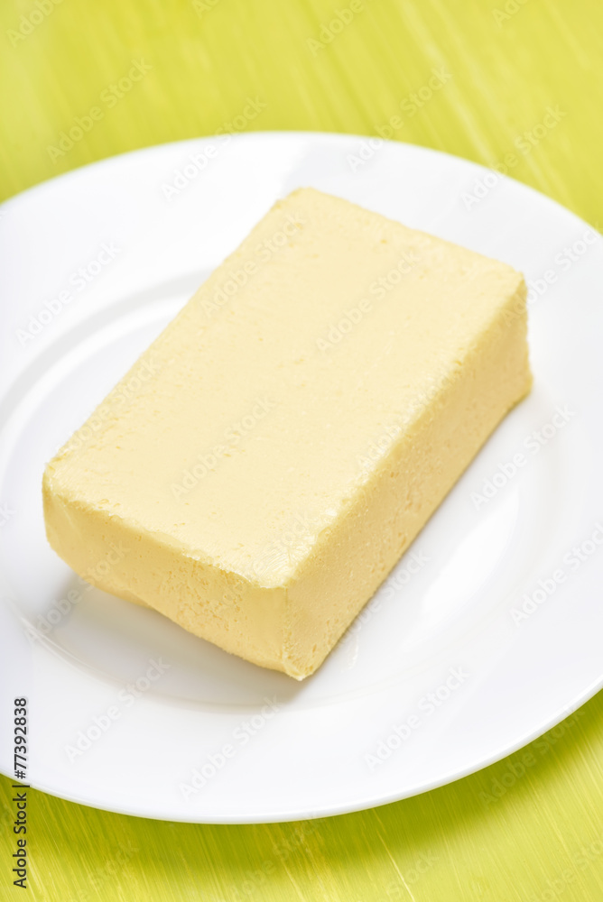 Butter on white plate