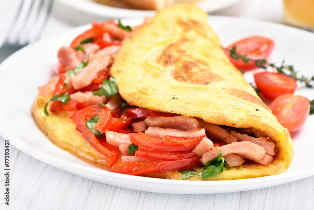 Omelette with vegetables and ham