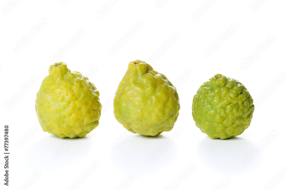 Fototapeta premium Yellow Mauritius papeda fruit on white background