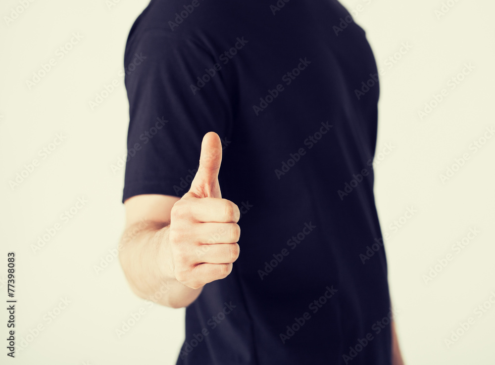man showing thumbs up man showing thumbs up